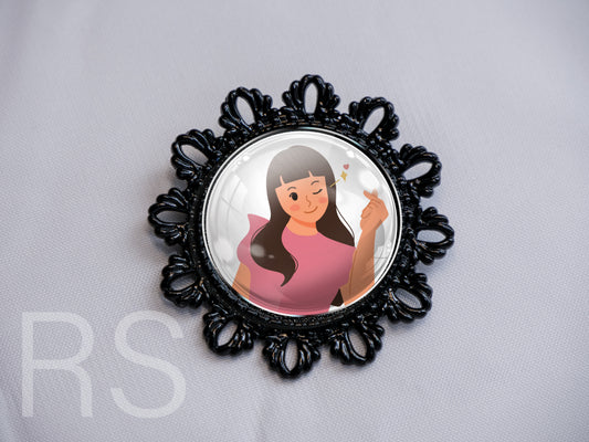 Broche noire ronde style baroque
