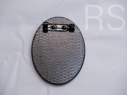 Broche noire (30x40mm)